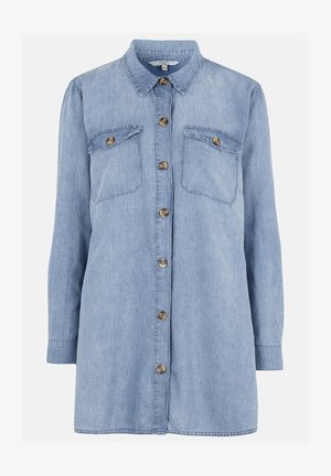 Ljusblå denimskjorta med knäppning framtill, två bröstfickor, klassisk krage och långa ärmar med knäppning vid ärmsluten.