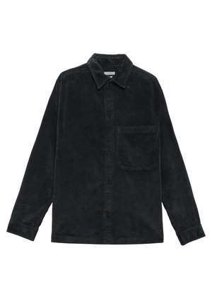 Black corduroy shirt with long sleeves, button closure, collar, and a chest pocket. Soft texture and ribbed surface pattern.
