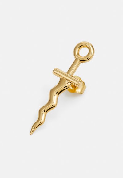 Goldfarbener Brosche in Form eines wellenförmigen Schwerts mit einer kreisförmigen Schlaufe und einem horizontalen Querbalken. Glatte, glänzende Metalloberfläche.