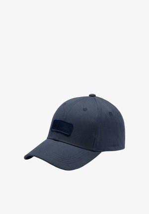 Navy blue cap made of cotton, featuring a curved brim, stitched accents, and a rectangular patch with logo detail on the front.