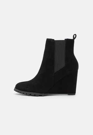 Stivaletti con tacco - black