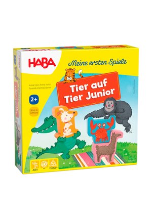 Box design for "Tier auf Tier Junior" game featuring colorful animal illustrations. Dominant colors are yellow, green, and coral. Includes textures and shapes.