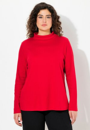 Haut rouge à manches longues avec col montant, fabriqué à partir d'un tissu doux et présentant une coupe décontractée. Design simple sans motifs ni embellissements.
