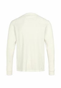 Langærmet, cremefarvet waffelstrikket bluse vist bagfra med rund halsudskæring og tætsiddende manchetter.