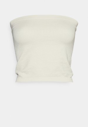 Rihmata ilma õlgeteta kreemjas värvitoonis topp tekstuuriga kangast, millel on soonikuline muster; elastne äär, et saavutada sobiv kuju.