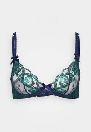 Námořnická krajková podprsenka se zelenými květinovými výšivkami, průhlednými košíčky, vlnitými okraji a dekorativními mašlemi na ramínkách. Obsahuje jemné detaily.