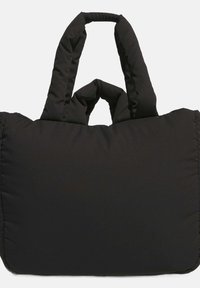 Black, padded tote bag with two short handles, featuring a soft, textured surface and a minimalist design.