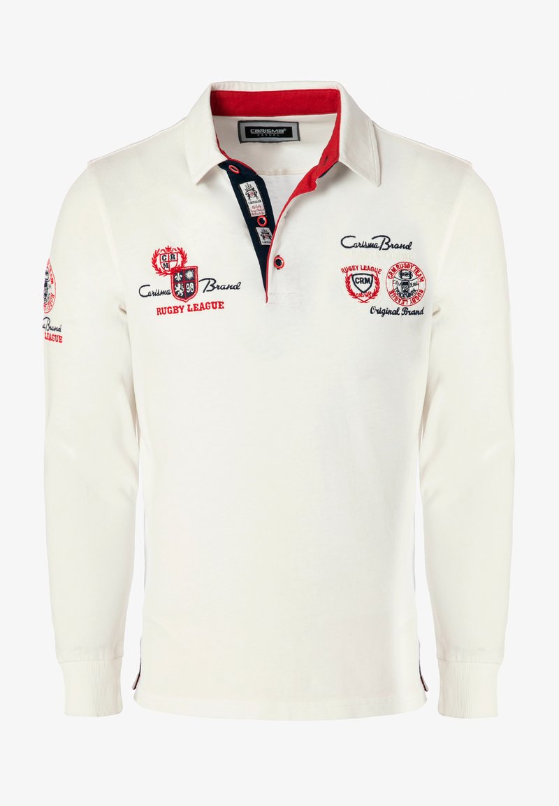 Valge pikkade varrukatega ragbi särk punaste detailidega, kirja õmmeldud logode jaotumine rinnal ja varrukatel, kontrastne krae ning nööbiga lahti.