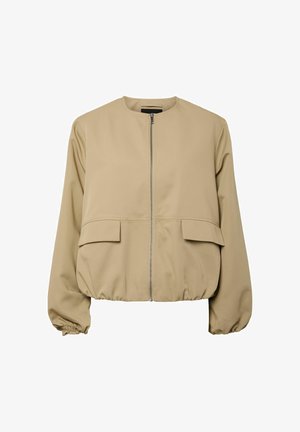 Beige jakke med glidelås, rund krage, to klaffelommer foran, lange rynkede ermer og elastisk kant.