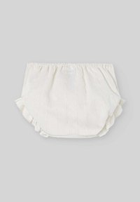 Culotte en coton blanc avec un motif rayé vertical texturé, taille élastique et accents froncés sur les côtés.