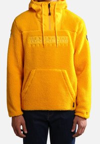 Yellow fleece pullover with a hood, featuring a kangaroo pocket and a textured, soft surface. Front logo in a contrasting hue.