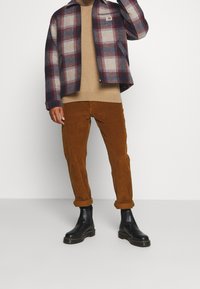Carhartt WIP Allvädersjacka - dark red