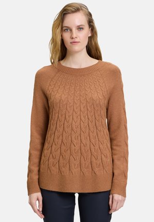 Brauner Kabelstrickpullover mit Rundhalsausschnitt und geripptem Saum. Enganliegende lange Ärmel, strukturiertes Muster und weiches Material.