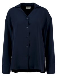 Camisa de botón azul marino con mangas largas, cuello y aberturas laterales. Hecha de una tela suave con un corte holgado y un brillo sutil.