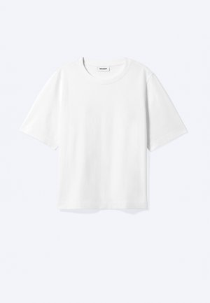 T-shirt blanc à manches courtes avec col rond et ourlet droit, étiquette de marque "WEEKDAY" à l’intérieur de l’encolure.
