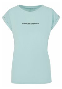 Lyseblå kortærmet T-shirt lavet af bomuld, med rund halsudskæring og trykt motiverende tekst i sort på forsiden.