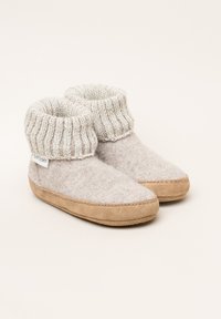 Light gray felt slippers with a ribbed knit cuff, rounded toe, and a light brown suede sole. Brand label visible on the side.