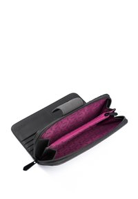 Black leather wallet with a pink patterned interior, featuring a zip compartment and card slots, opening to reveal organized storage.