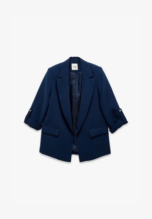 Tumman sininen bleiseri, jossa on räätälöity muotoilu, jämäkät läpät, käärityt hihat, kaksi etutaskua ja sileä vuori.