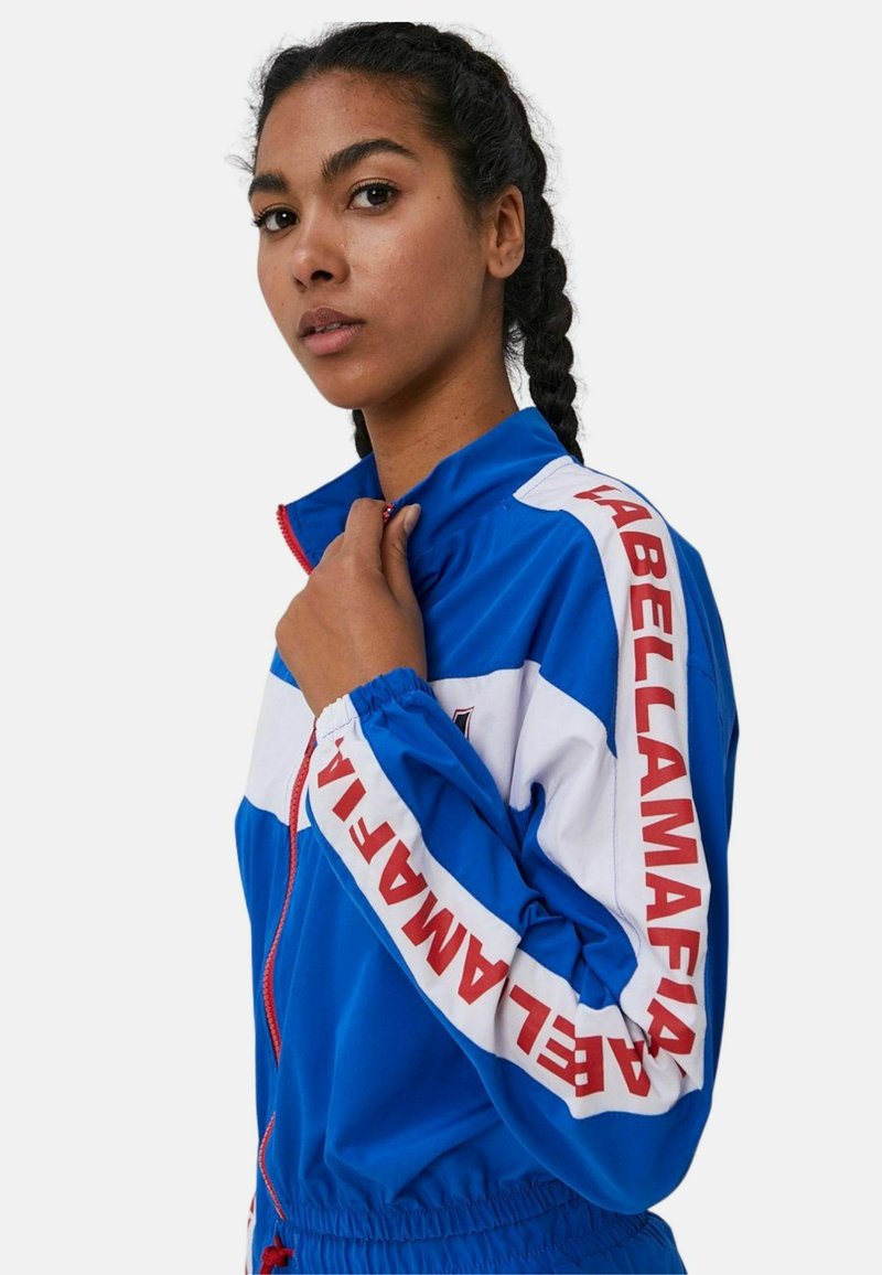 Damen Leichte Jacken | Labellamafia Trainingsjacke blau - BK12751 Damen Leichte Jacken | Labellamafia Trainingsjacke blau - BK12751