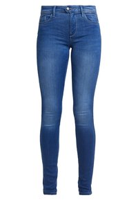Blå denim skinny jeans med midja och femficksdesign, samt subtil blekning på låren. Har en knappstängning fram och bälteslingor.