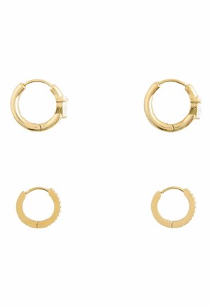 Two pairs of small gold hoop earrings, one pair with clear gems and one pair plain, arranged on a white background.
