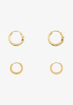 Two pairs of small gold hoop earrings, one pair with clear gems and one pair plain, arranged on a white background.
