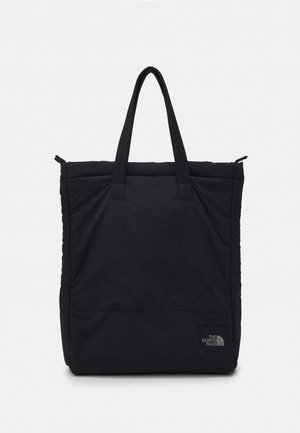 Sac cabas noir The North Face avec de longues anses, une fermeture zippée sur le dessus et un petit écusson logo près du coin inférieur droit.