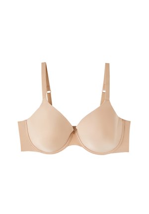 Beige beugelbh met zachte cups, verstelbare bandjes en eenvoudige stiksels. Het materiaal lijkt rekbaar en zacht te zijn.