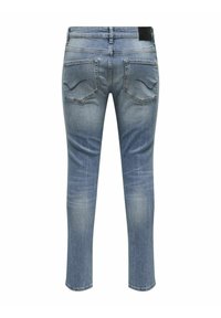 Blauwe denim jeans met een slim fit. Heeft een klassiek vijf-pocket ontwerp, vervaagde textuur en subtiele stiksels op de achterzakken.