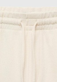 Mango XAVIS - Teplákové kalhoty - off-white