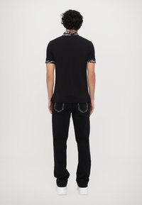 Versace Jeans Couture Polotričko - black
