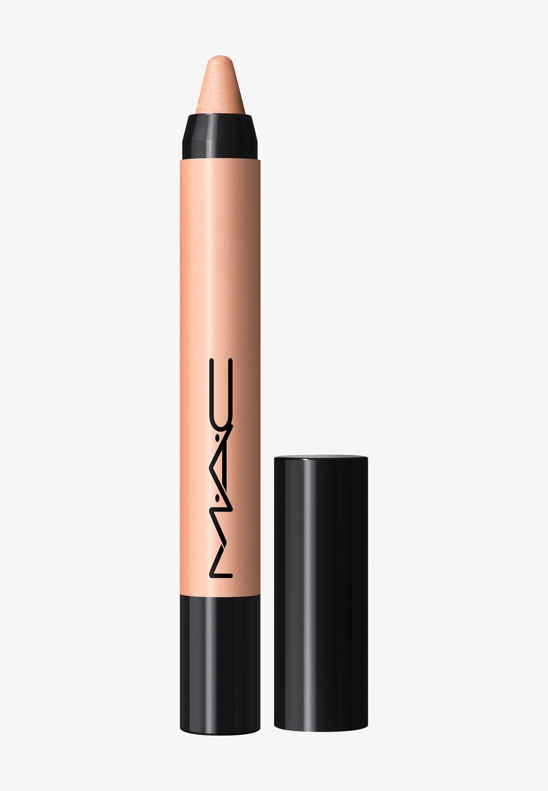 Nude crèmekleurige lipcrayon met een puntige tip, voorzien van een matte afwerking en een zwarte draaidop. De dop is zwart, wat het slanke ontwerp benadrukt.