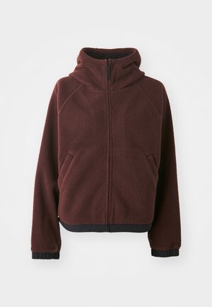Burgundy fleece jacket with a hood, front zipper, side pockets, and black elastic trim at cuffs and bottom hem. Textured surface finish.