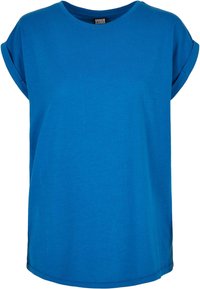 T-shirt blu a maniche corte realizzato in cotone morbido, con scollo rotondo e orli delle maniche arrotolati, dalla vestibilità morbida.