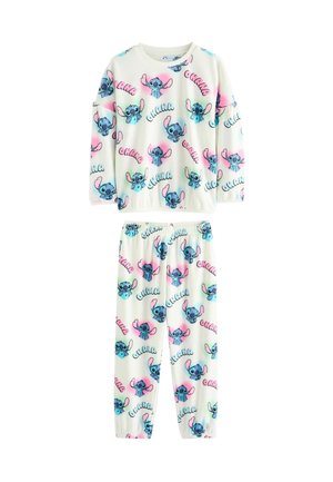Set de pijamale albe pentru copii, cu fețe de desen animat Stitch în nuanțe de albastru și roz, și un model cu textul "ohana" pe partea de sus și pe pantaloni.