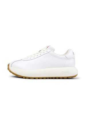 White leather sneaker with a rounded design, featuring a thick, beige rubber sole and textured accents. Minimalistic lacing and branding detail.