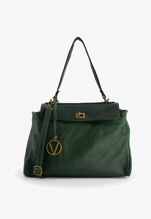 Green leather handbag with a textured flap, gold hardware, contrast stitching, and a detachable strap featuring a circular charm.