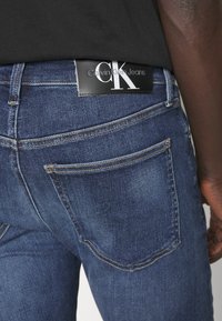 Calvin Klein Jeans SKINNY - Jeans Skinny Fit - denim dark