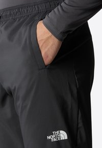 The North Face MA WIND - Teplákové kalhoty - asphalt grey
