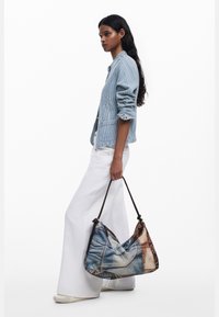 Desigual Handtasche - material finishes