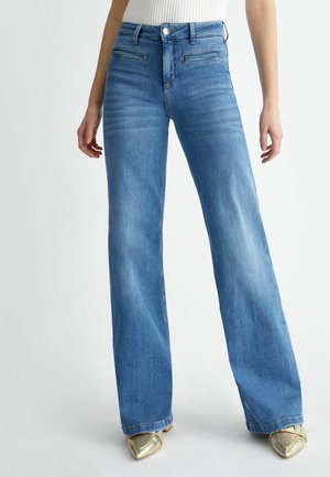Flared Jeans - blue denim