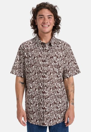 Short-sleeve shirt with a brown and white geometric pattern; features a button-down collar and chest pocket, made of lightweight fabric.