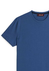 T-shirt in cotone blu con maniche corte, scollatura rotonda e texture liscia. Presenta un'etichetta piccola sul collo con i dettagli del marchio.