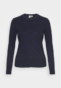 Tmavě modrý pletený kardigan s kulatým výstřihem, dlouhými rukávy a zapínáním na knoflíky vpředu. Má žebrovaný lem a manžety.