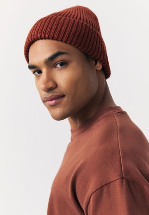 Next Kootud müts - rust brown