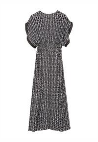 Robe noire et blanche avec un motif de feuilles, manches courtes volantées, taille froncée et coupe fluide arrivant au genou.