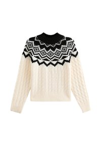Chunky knit sweater in cream with a black patterned yoke. Features a ribbed neckline and hem, with a textured cable knit design.