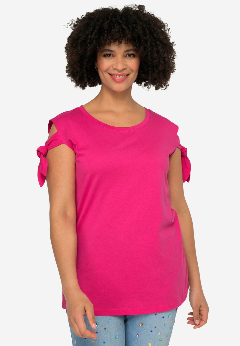Rosa T-Shirt mit kurzen Ärmeln und Bindedetail an den Ärmeln, aus weicher Baumwolle gefertigt, mit einem runden Halsausschnitt und einer l�ässigen Passform.