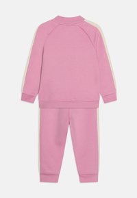 Puma MINICATS T7 ICONIC SUIT UNISEX - Verryttelypuku - mauved out